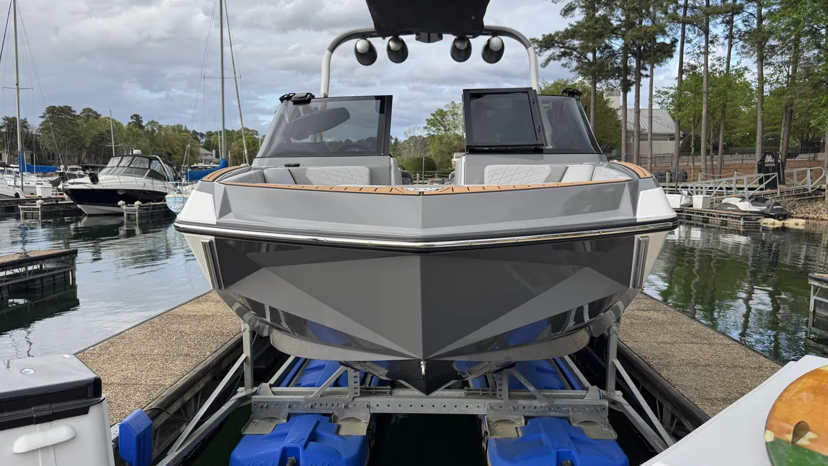 Surf boat: head-on at a Lake Norman marina lift